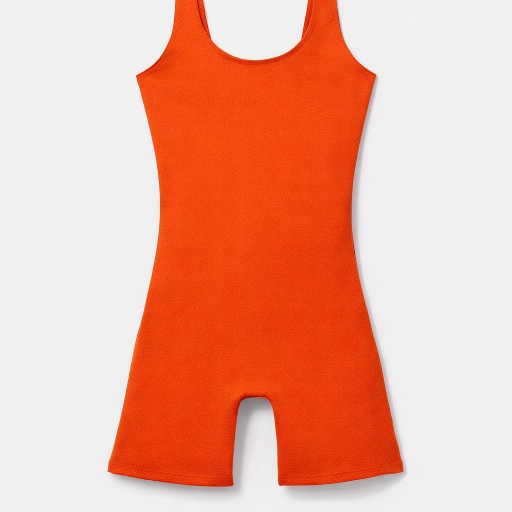 Nwot Girlfriend Collective burnt Orange athletic onesie. Reg $98